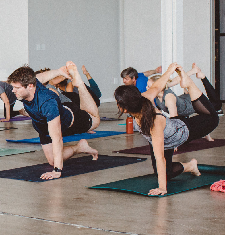 A tranquil scene of a yogi or yogini in Savasana, surrendering to stillness and serenity